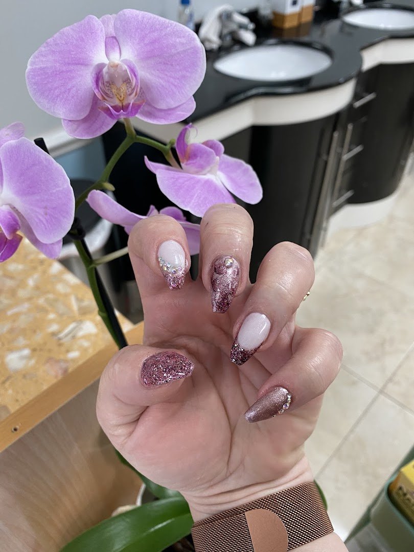 Close-up of a fresh gel manicure on hands